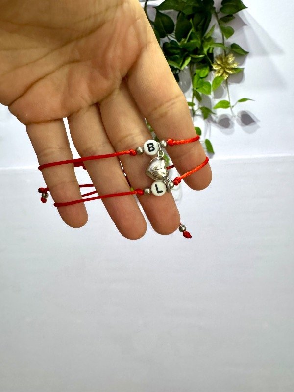 Producto - Pulseras hilo rojo imantadas