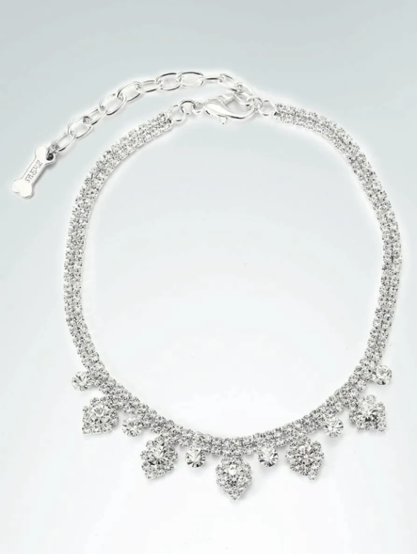 Producto - Collar con dijes y brillo.