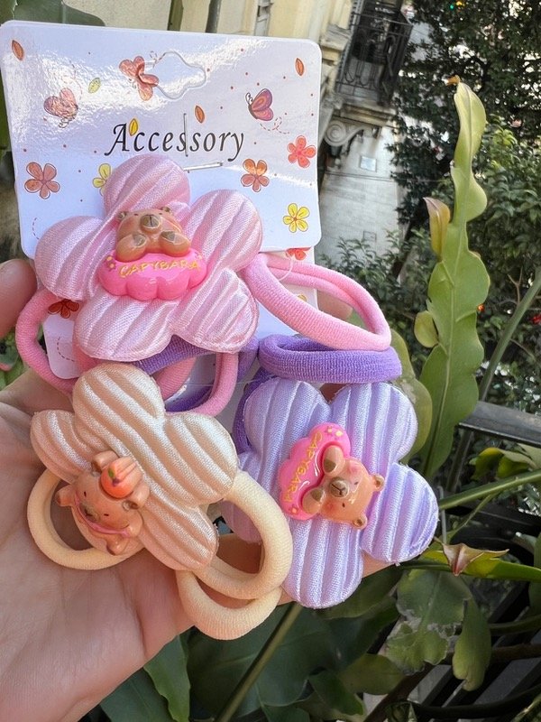 Producto - Tira de colitas de flor capibara