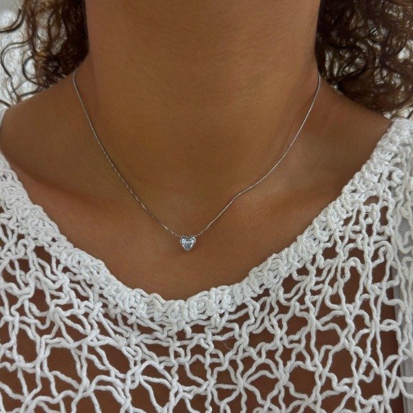 Producto - CONJUNTO ACERO CLAPTON CON CORAZON CUBIC PASANTE