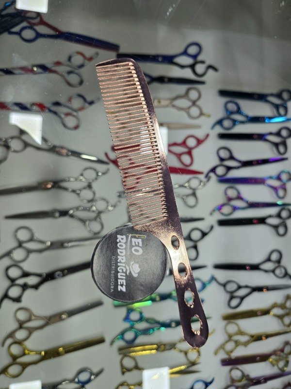 Producto - PEINE METAL CON MANGO ROSE GOLD