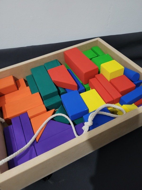 Producto - Carrito con ruedas con 50 bloques de colores