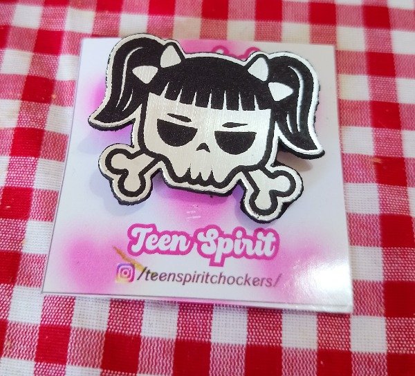 Producto - prendedor cazz