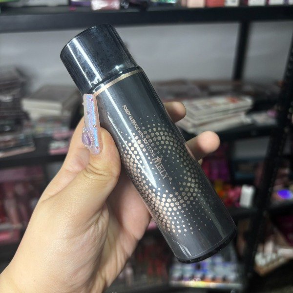 Producto - Fijador en Spray Mely