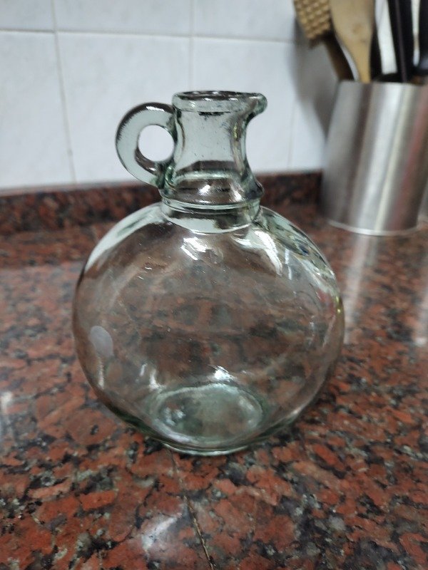 Producto - Botella de vidrio con asa