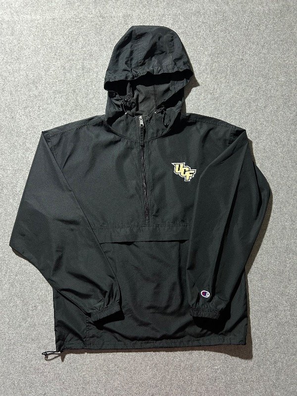 Producto - Anorak rompevientos pacable, color negro. Talle M