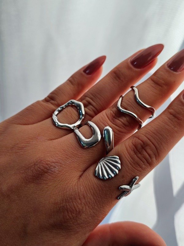 Producto - Anillos regulables inflados plateados por docena surtida