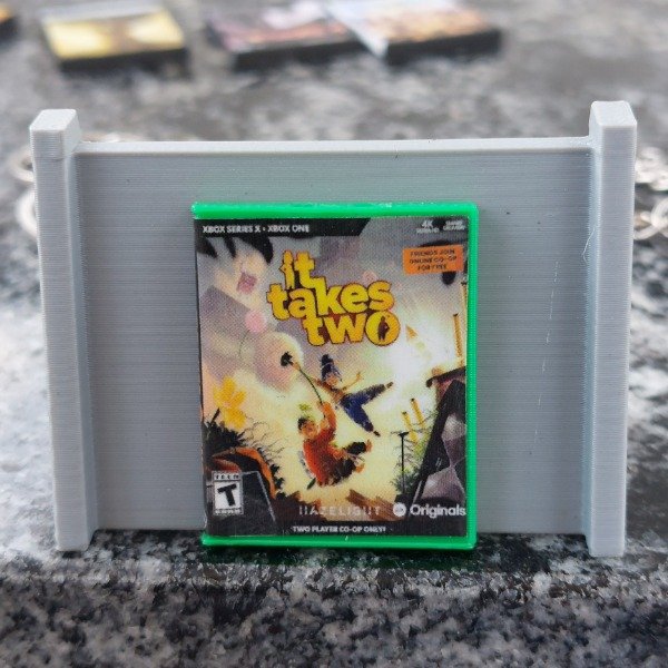 Producto - Llavero de It Takes Two - 0