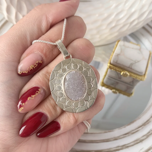 Producto - Dije oval con piedra lila
