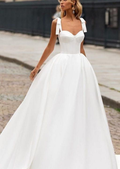 Vestido de novia corte A con corset y moños - By Holly Vestidos