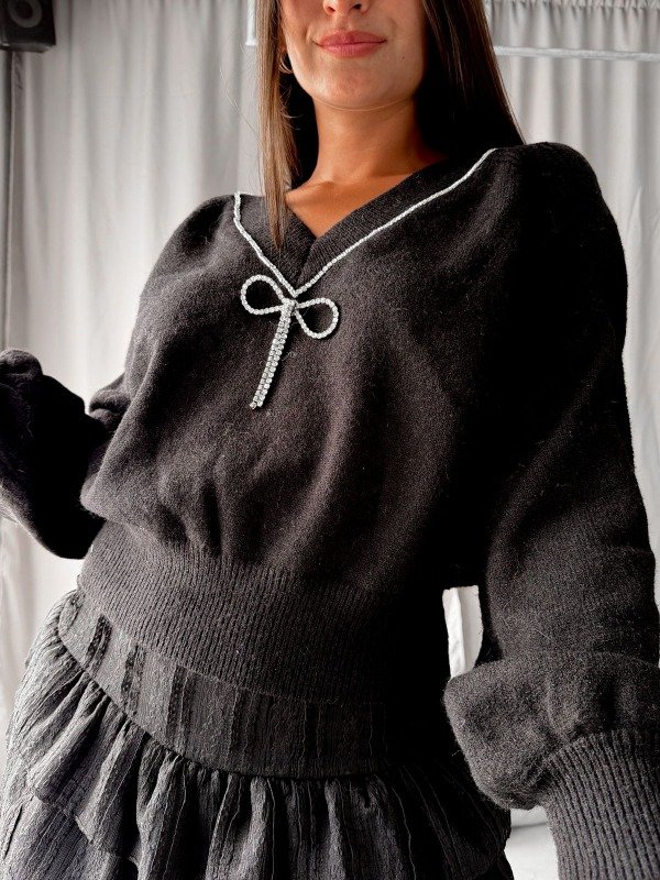 Producto - Sweater con moño y escote V