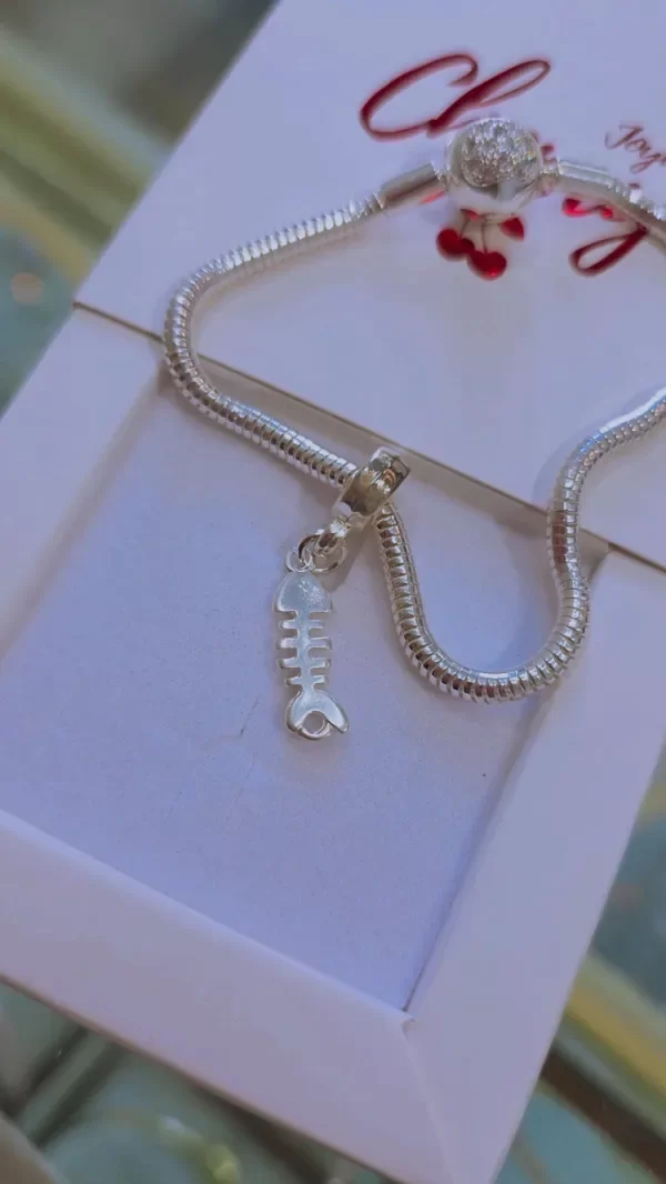 Producto - Charm pez AB