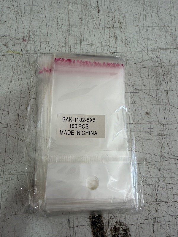 Producto - Bolsita de polipropileno con pegatina y para colgar 5x5 x 100i