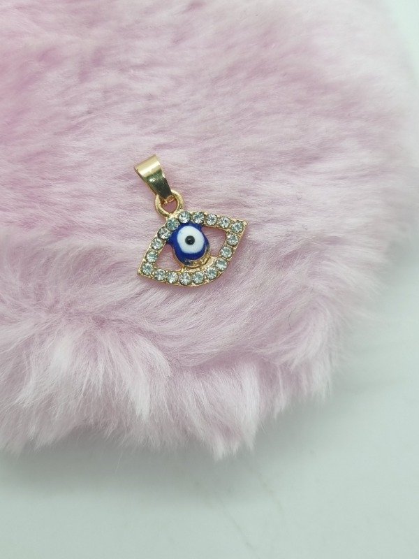 Producto - Dije acero dorado ojo turco calado strass