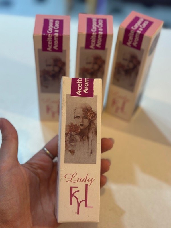 Producto - Aceite corporal aroma a coco con glitter