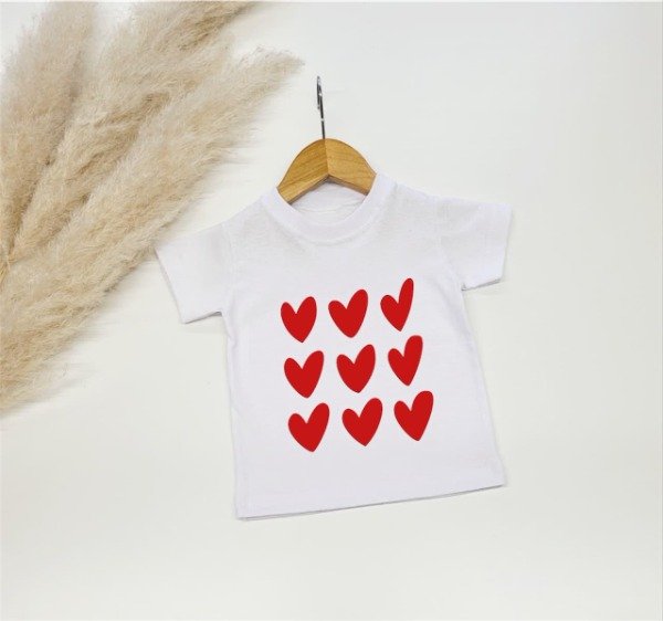 Producto - Remera navideña corazones